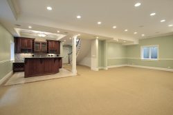 Remodeled basement with kitchen area